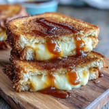 Spicy-sweet Honey Sriracha Grilled Cheese sandwich, perfectly grilled for a delightful bite.