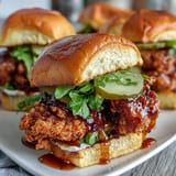 Golden brown fried chicken sandwich with spicy hot honey, perfect for lunch.