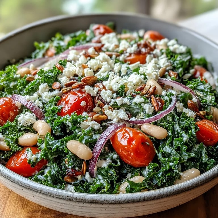 Freshly prepared White Bean and Kale Salad, artfully combined with tomatoes and seeds.