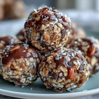 Energy balls with oats and chocolate chips, perfect soccer game snacks, packed with peanut butter and coconut.